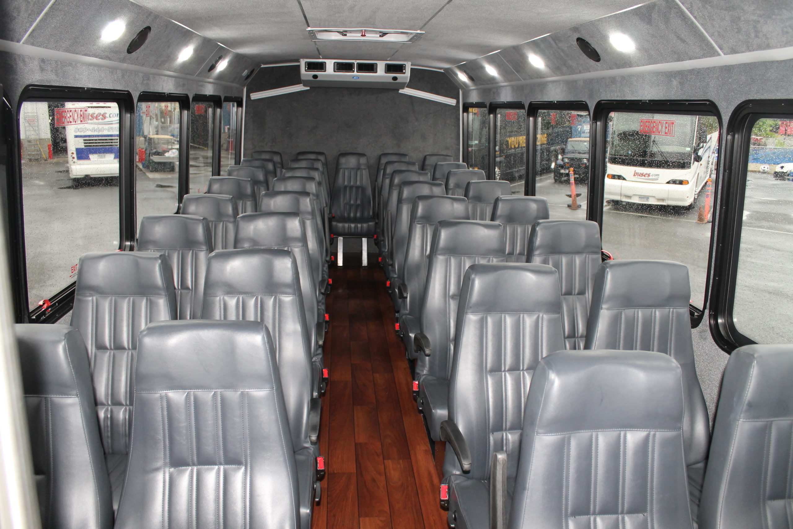 Buses inside a new charter bus